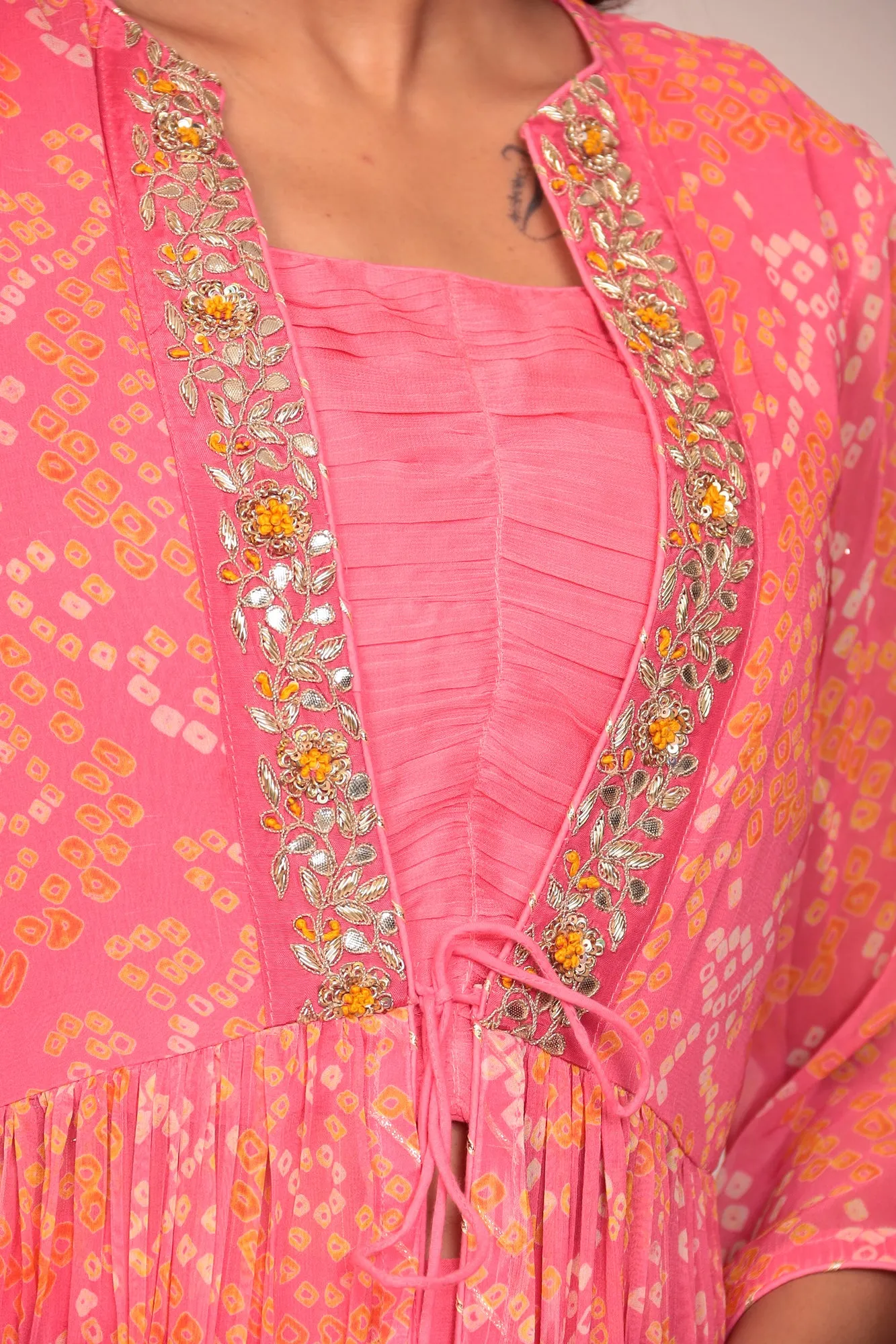 Sure! Heres an optimized title for the e-commerce product:

Exquisite Bandhej Georgette Jacket-Style Suit with Intricate Gota Patti and Thread Embroidery